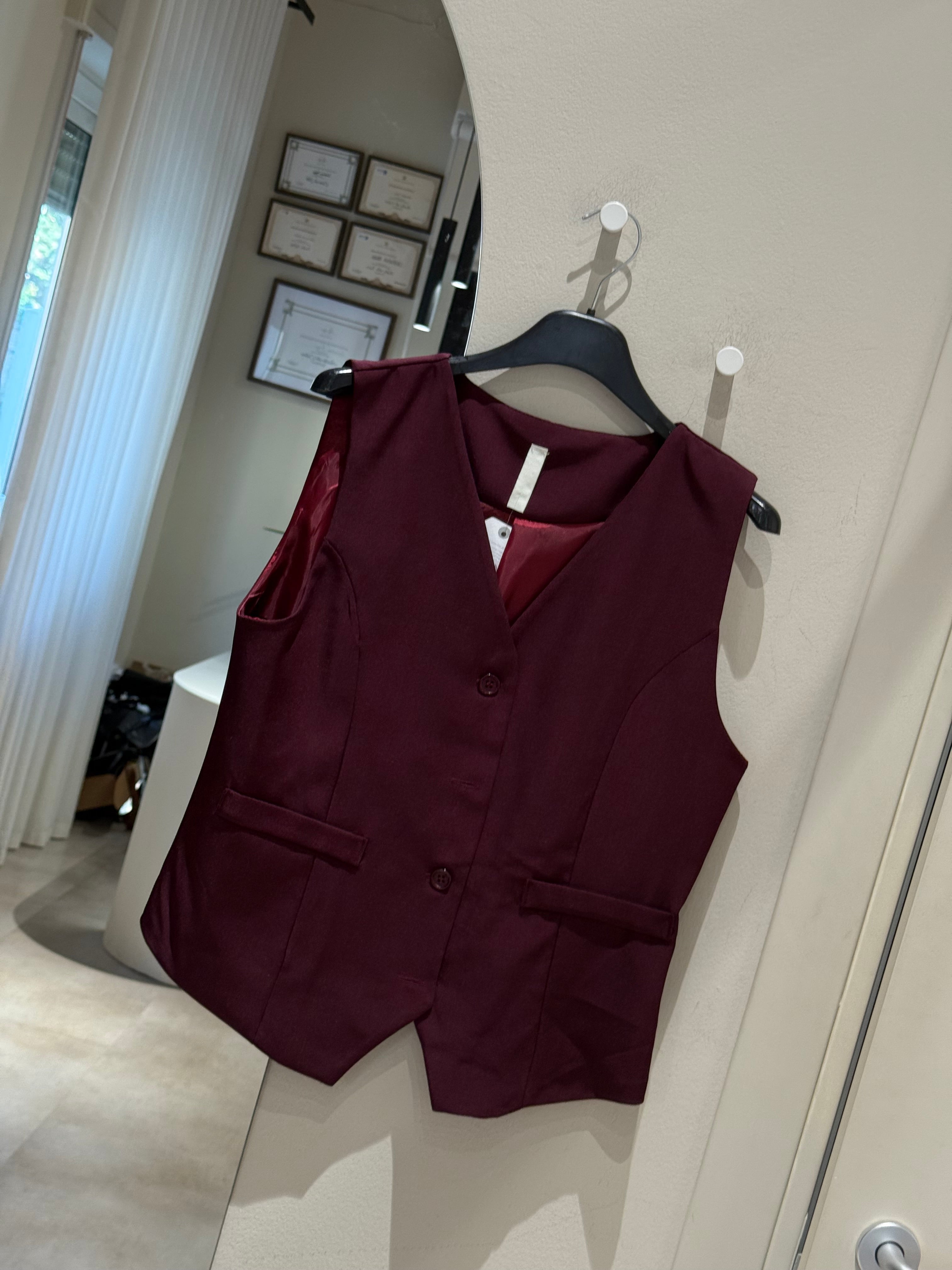 Gilet bottoni