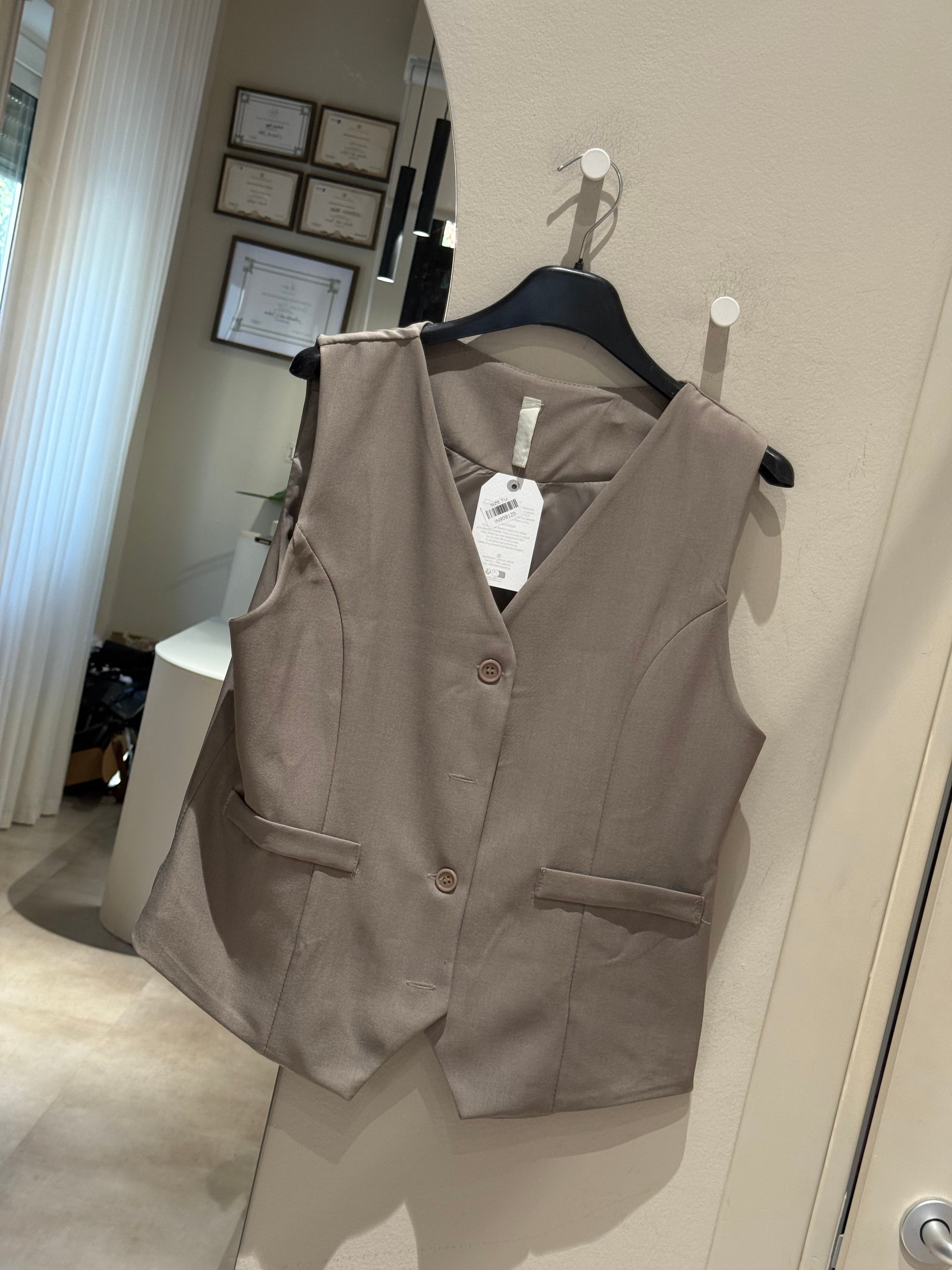 Gilet bottoni